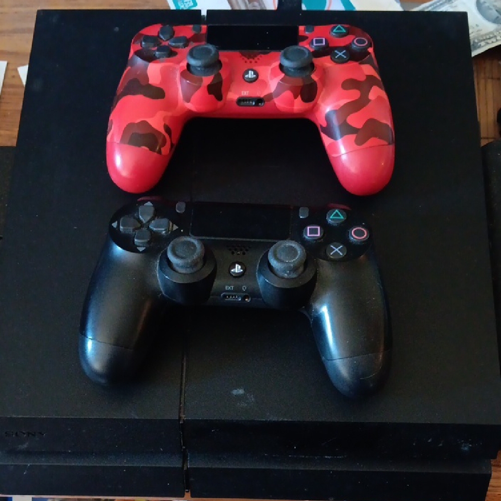 Sony PlayStation 4 Console with DualShock Controllers